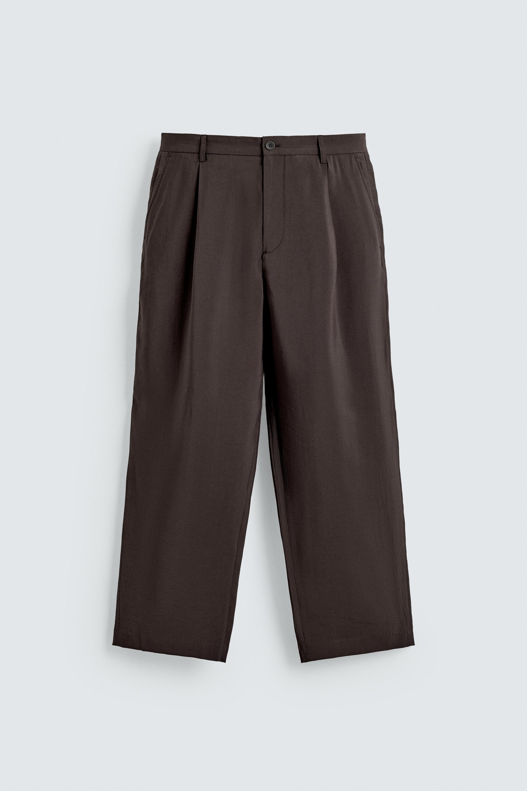 FLOWY PLEATED PANTS